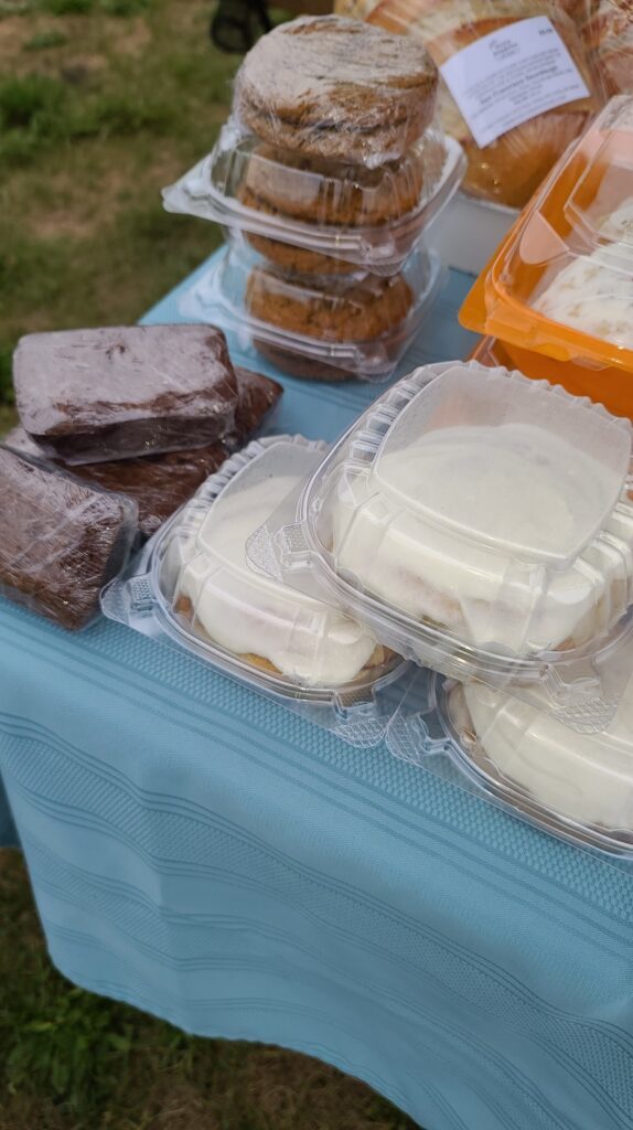 Table with baked goods at Holly Farmer's Market